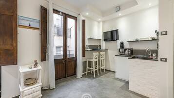 Fridge, microwave, stovetop, coffee/tea maker