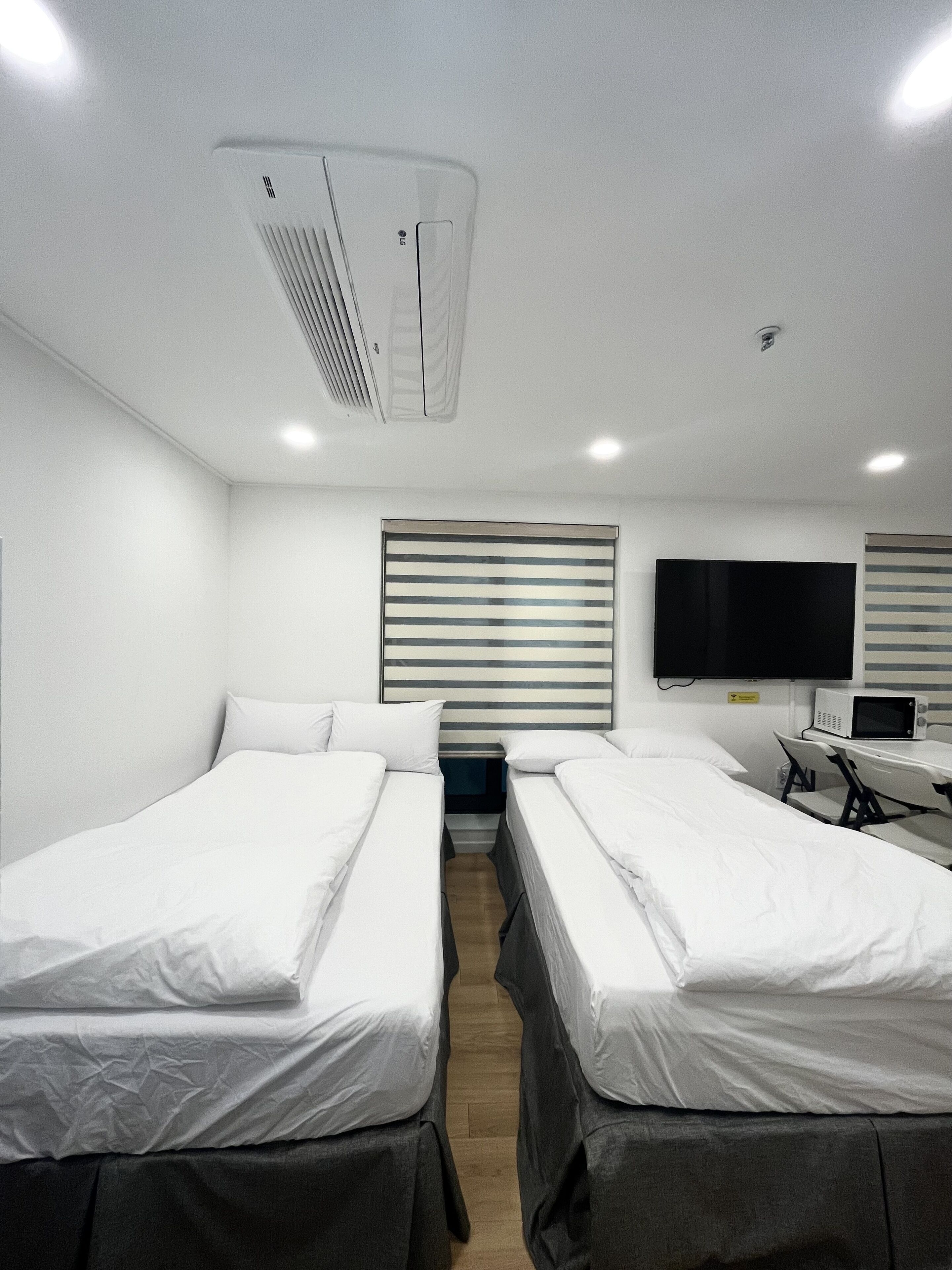 Habitación cuádruple familiar | Ropa de cama de alta calidad y decoración individual