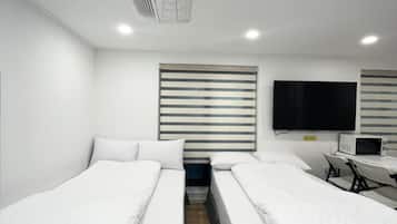 Habitación cuádruple familiar | Ropa de cama de alta calidad y decoración individual