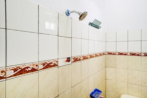 Shower, rainfall showerhead, towels, toilet paper