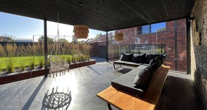 Group home with swimming pool and wellness