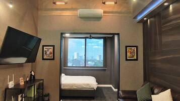 Appartamento Design | Area soggiorno | Smart TV 64 pollici con canali digitali, Netflix, servizi in streaming