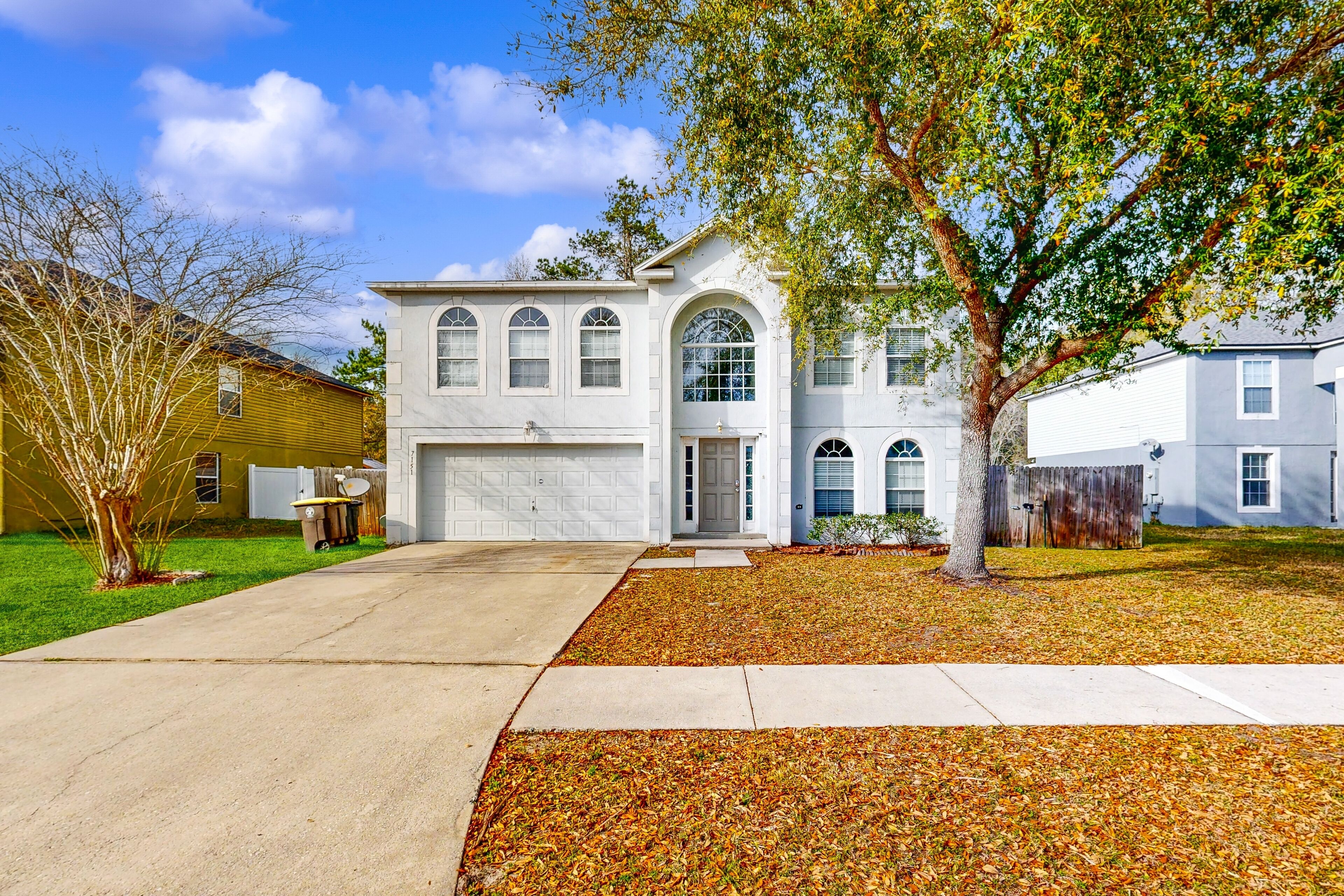 Serene home  with enclosed yard and screened in back patio