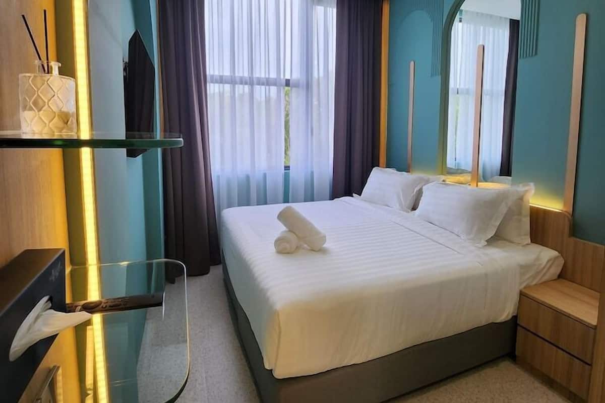 Down duvets, Select Comfort beds, in-room safe, desk