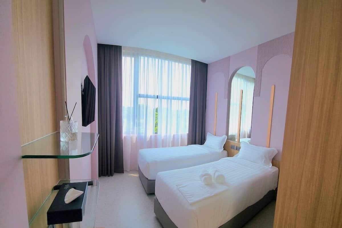 Down duvets, Select Comfort beds, in-room safe, desk