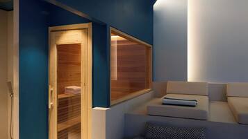 A modern spa room with a wooden sauna, a seating area with cushions, and a large window.