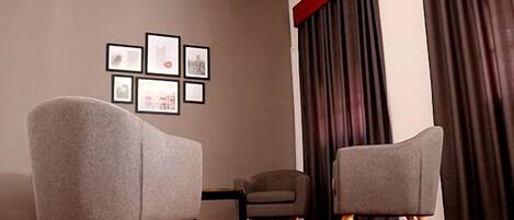 25-inch flat-screen TV with satellite channels, TV