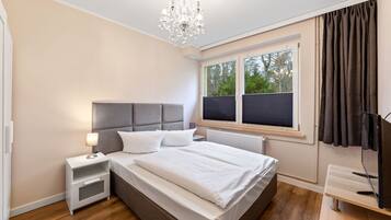 2 habitaciones, tabla de planchar con plancha, wifi y ropa de cama