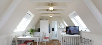 Two wooden staircases adapted to the charm of the house...