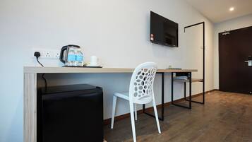 Desk, bed sheets, wheelchair access