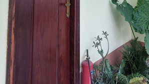 A wooden door with a brass handle and a number '04' above it. - Hoa Anh Dao Garden Hotel (Ho Chi Minh City)