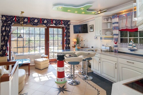 Diese wunderschöne helle und maritim gehaltene Ferienwohnung