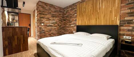 1 غرفة نوم ومكواة/لوح كي وواي فاي مجانًا وملاءات أسرّة