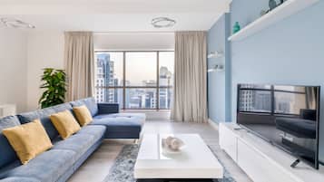Deluxe 2BR Apartment  - Marina View | Living area | 55-inch Smart TV with cable channels, TV