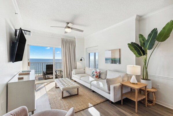 Signature Condo, 3 Bedrooms, Balcony, Beach View | Living room | 55-inch Smart TV with cable channels, TV