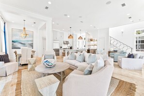 Living area - 'sapphire Sunset" 6br/6.5bth + 6 Seater Golf Cart In The Lake District Of Watercolor 6 Bedroom Home by RedAwning (Santa Rosa Beach)