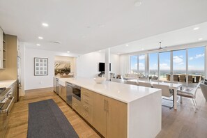 Condo, 5 Bedrooms | Private kitchen | Fridge, oven, coffee/tea maker, toaster