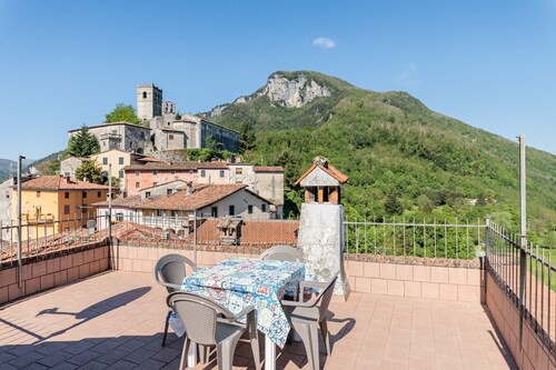 Apartment 'La Casa Di Anita' with with a view from a large panoramic terrace over the mountains