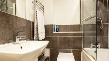 Apartment | Bathroom | Combined shower/tub, deep soaking tub, hair dryer, towels