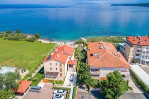 Stunning views of a serene body of water surround this peaceful neighborhood.