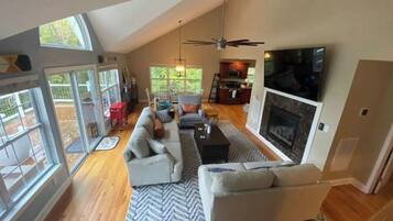 Smart TV, fireplace, books