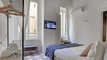 Apartemen Deluks | Setrika/meja setrika, tempat tidur bayi, Wi-Fi gratis, dan seprai linen