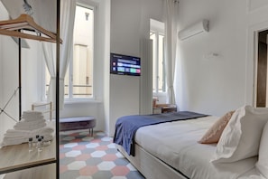 Apartemen Deluks | Setrika/meja setrika, tempat tidur bayi, Wi-Fi gratis, dan seprai linen