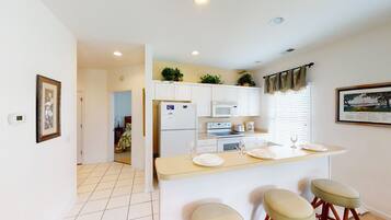 Condo, 2 Bedrooms | Private kitchen | Fridge, oven, coffee/tea maker, toaster