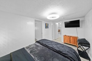 4 bedrooms, desk, iron/ironing board, travel cot