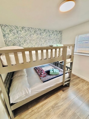 3 bedrooms, desk, iron/ironing board, travel crib