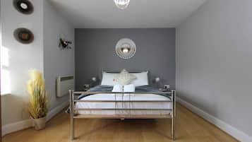 2 habitaciones, tabla de planchar con plancha, cuna de viaje y wifi