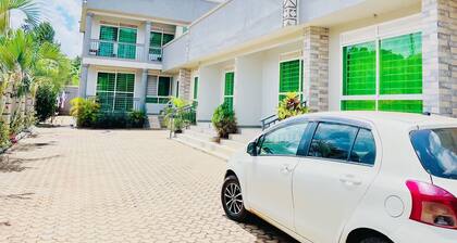 Apartment unit - White House with rental car.