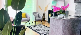 Apartment unit - White House with rental car.