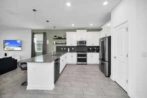 Fridge, microwave, oven, stovetop - EV_9282 - 7 Bed 5 Bath Villa with Screened Private Pool, Spillover Spa, Kids Bed (Davenport)