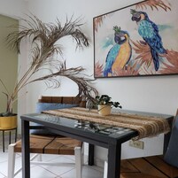 Honeymoon Apartment | Living area | 75-inch Smart TV with digital channels, streaming services