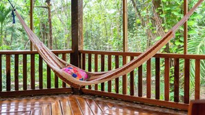 Pillow-top beds, individually decorated, individually furnished - The Cabins at Monkey Fall (San Ignacio)