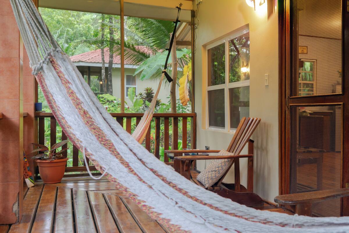 Family Cabin, 1 Bedroom, Refrigerator & Microwave, Garden View | Pillowtop beds, individually decorated, individually furnished