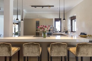 Fridge, coffee/tea maker, dining tables