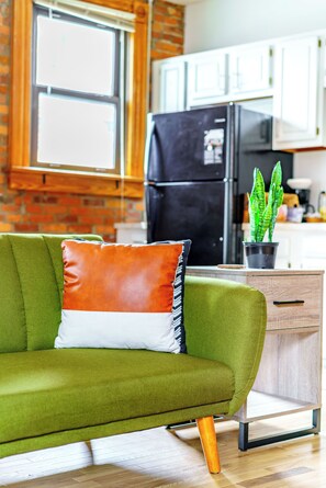 Book Loft | Living area | 55-inch Smart TV with digital channels, TV, Netflix - Jungle House Luxury Lofts – Short North High Street (Columbus)