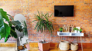 Casa on High | Living area | 55-inch Smart TV with digital channels, TV, Netflix
