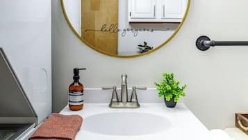 Casa on High | Bathroom | Rainfall showerhead, eco-friendly toiletries, hair dryer, towels