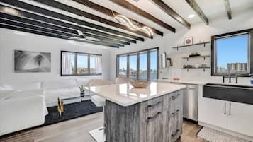 Design Studio Suite, 1 Queen Bed, Bay View | Living area | 45-inch Smart TV with digital channels