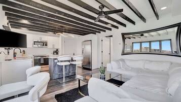 Design Studio Suite, 1 Queen Bed, Bay View | Living area | 45-inch Smart TV with digital channels