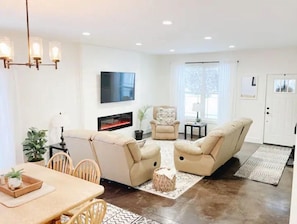 Smart TV, fireplace, books