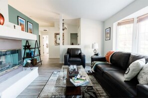 Smart TV, fireplace, books