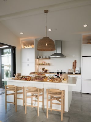 Penthouse | Private kitchen | Dining tables