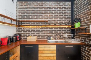 Basic Villa, Multiple Beds | Private kitchen | Fridge, microwave, stovetop, cookware/dishes/utensils