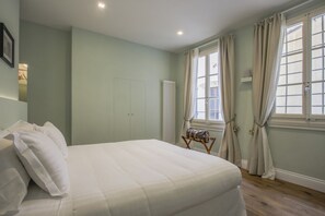 1 habitación, tabla de planchar con plancha, wifi y ropa de cama 