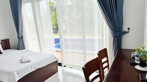 Habitación triple estándar | Terraza o patio