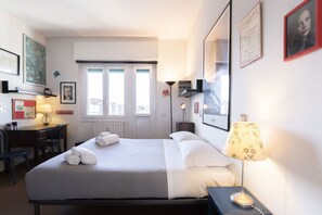 1 slaapkamer, een strijkplank/strijkijzer, beddengoed